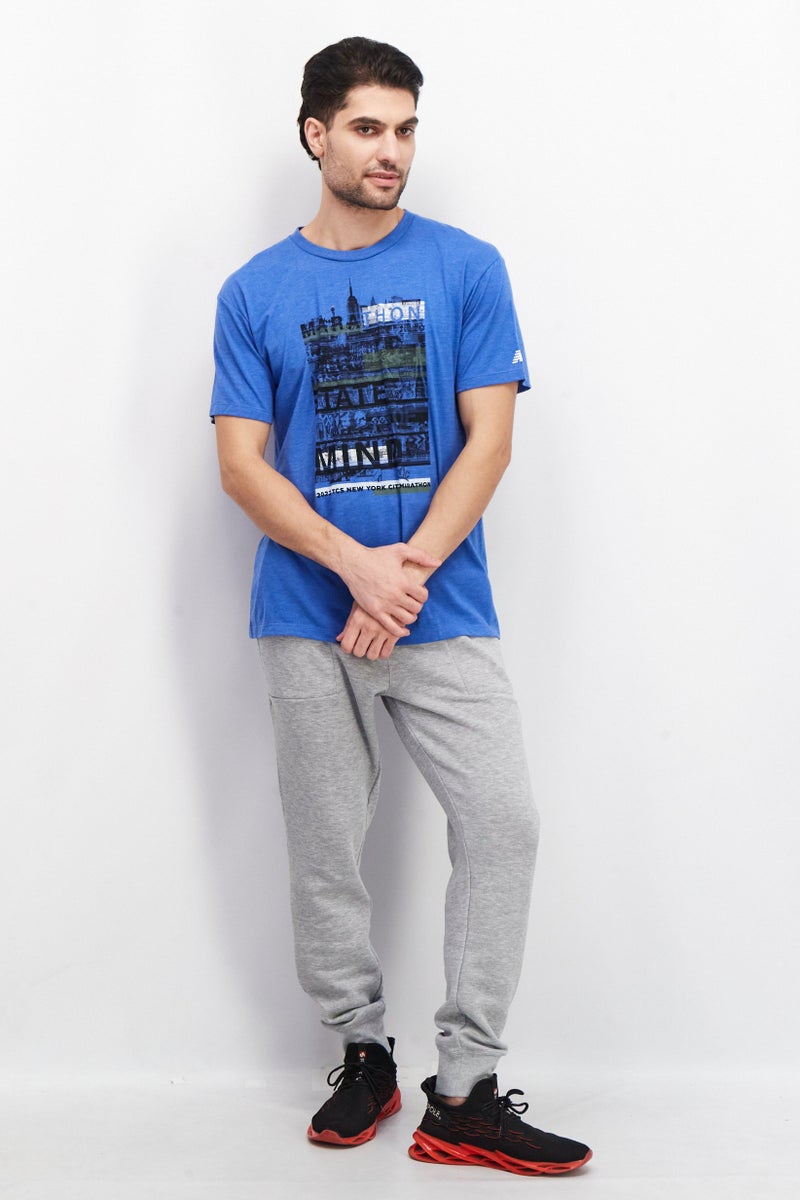 New Balance Men Sportswear Fit Short Sleeves Graphic T-Shirt, Team Royal - Image 4